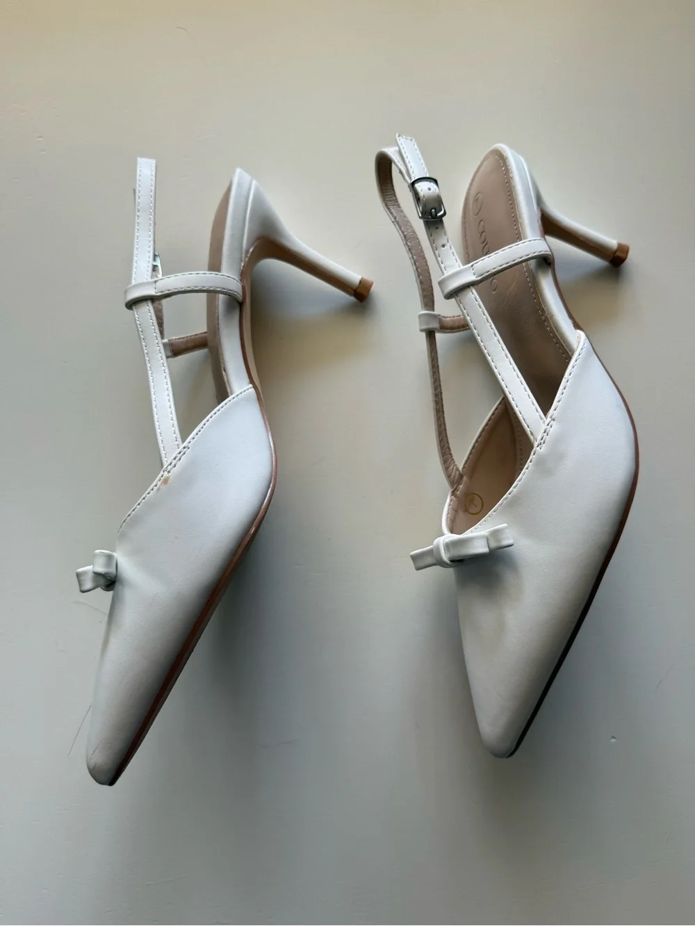 White Pointed Slingback Heels with Bow Accent